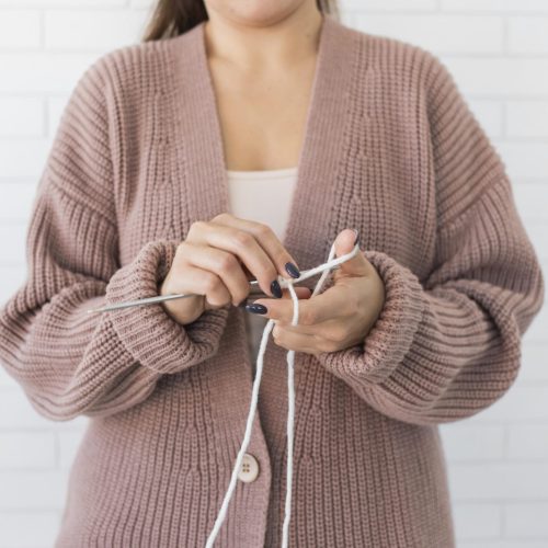 woman-home-knitting-close-up